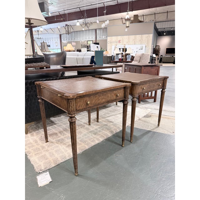 A handsome pair of Kreiss Louis XVI style writing tables that blend classical French design with refined functionality....