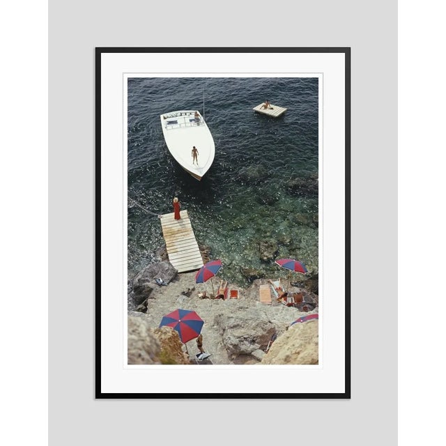 Modern Coming Ashore 1973 by Slim Aarons Framed C-Print Photograph For Sale - Image 3 of 3