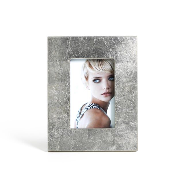 Our striking Silver Leaf Frames make the most of your memorable moments, surrounding photos in a wide border of silver...