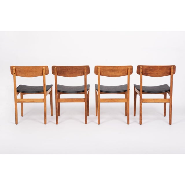 Mid Century Danish Teak Wood & Black Vinyl Dining Chairs For Sale - Image 4 of 13