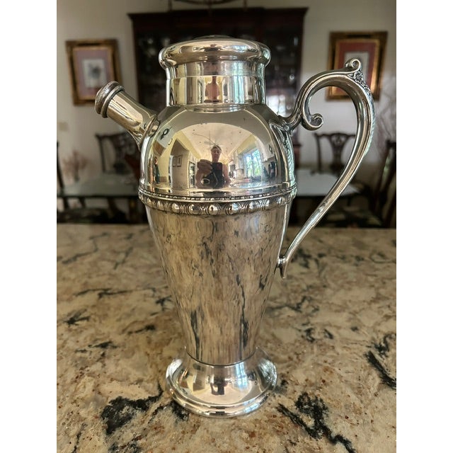 Extremely nice Wm Rogers & Sons Silverplate Cocktail Shaker #1768. Top and screw cap are in great condition as well. 11...