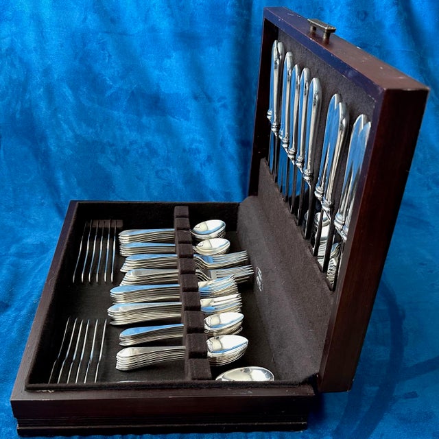Tiffany&Co. Faneuil antique Set for 12, with 2 additional teaspoons and a serving spoon, a total of 75 pieces. Classic...