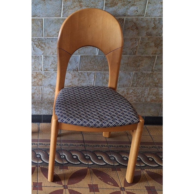 Elegant and finely constructed pair of Danish "Morten" dining chairs by Niels Koefoed, the seats covered with a...