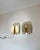Pair of high-end wall lights made of tubular melted glass suspended on a brass base. Designed by the iconic firm doria in...