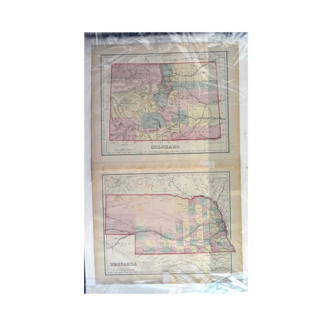 This remarkable 32" x 20" antique two-sided map offers a dual historical perspective on the American plains and burgeoning...