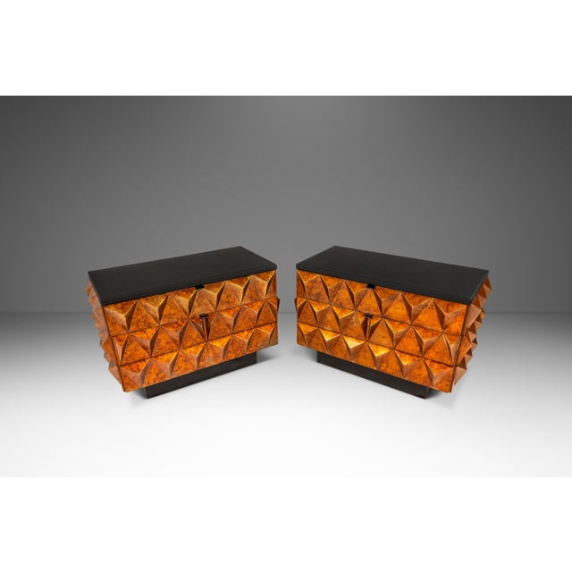 This striking set of two Brutalist sculptural end tables, crafted in Italy during the 1970s, captures the bold artistry of...