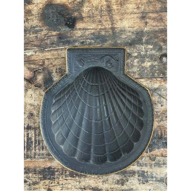 This vintage Italian black porcelain shell box combines sculptural form with practical function. Crafted in porcelain with...