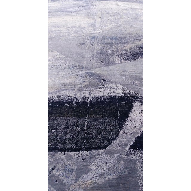 Beautiful hand knotted modern rug. Made of 75% wool and 25% silk with very modern design and colors, this extremely...