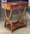 Gorgeous European influenced neoclassical side table with drawer. Crafted in solid maple with thoughtful factory...