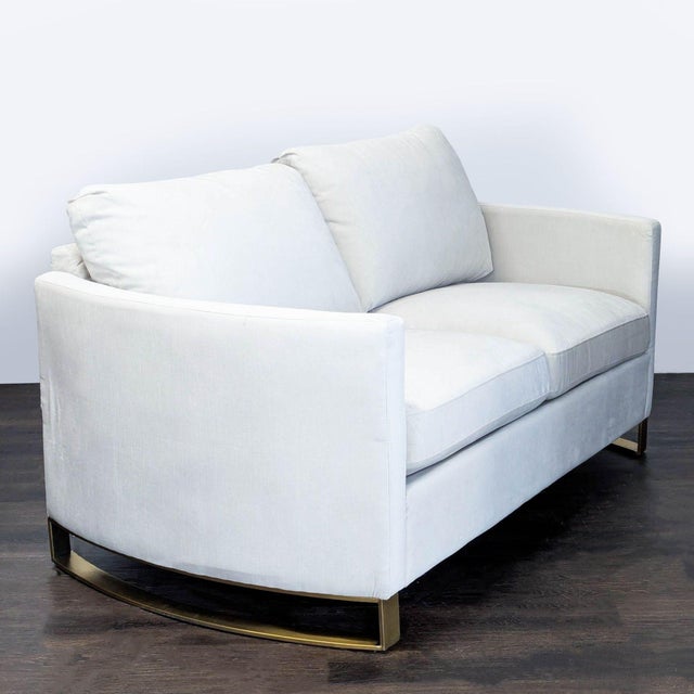 This Coaster loveseat features a clean fabric and plush cushions for cozy seating. Its modern curved shape and striking...
