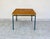 Elegant side table with a clean design typical of Scandinavian modernism from the 1960s and 70s. Its rectangular teak top,...
