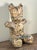 This vintage handmade paper mache bear form piñata is constructed from layered Filipino comic book pages, featuring...