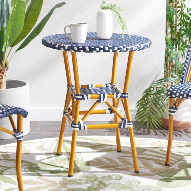 Give a breezy and charming update to your outdoor spaces with our California bistro table. A modern cafe table is...