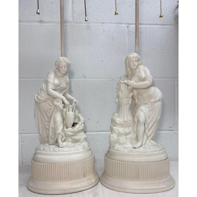 Up for sale is a wonderful pair of vintage French NeoClassical parian porcelain electric table lamps. Handmade in the...