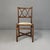 Italian chair in rattan and floral fabric, early 20th century Chair with a square seat in floral fabric and rattan frame...