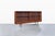 Presenting a stunning vintage walnut credenza or bookcase, a true gem designed by Merton L. Gershun for American of...