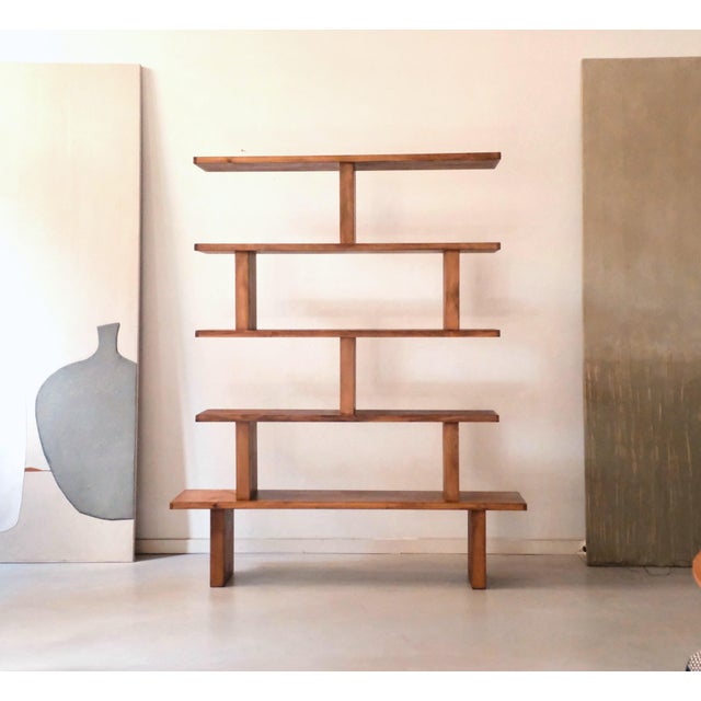 Freestanding bookcase in solid cedar, a centerpiece of the Mobili Mundi collection, stamped and numbered. Design inspired...