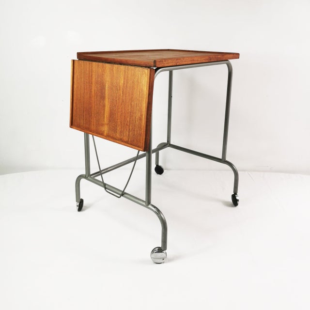 This table originates from Denmark, 1950s. It features a minimalist, spacious design with a focus on functionalism –...