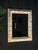 Rectangular wall mirror with a fabric-wrapped frame in a unicorn and floral motif, with pastel stripes in blush pink,...