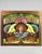 Victorian era stained glass window with a hand-painted central angel portrait in original wood frame, late 19th century. A...