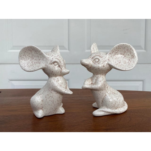 A pair of lovely ceramic mice with huge ears. A fun accent for your tabletop, shelf, or nursery.