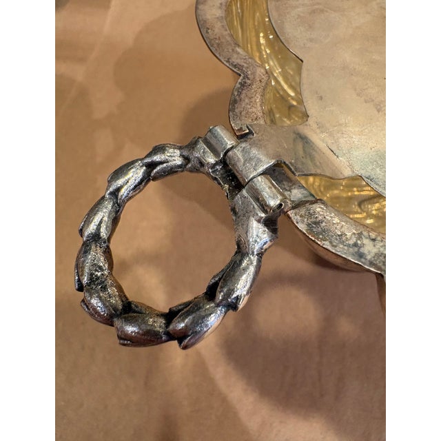 This is an antique muffiniere perfect for keeping muffin, biscuits, or toast warm on the dining table. This is a silver...