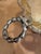 This is an antique muffiniere perfect for keeping muffin, biscuits, or toast warm on the dining table. This is a silver...