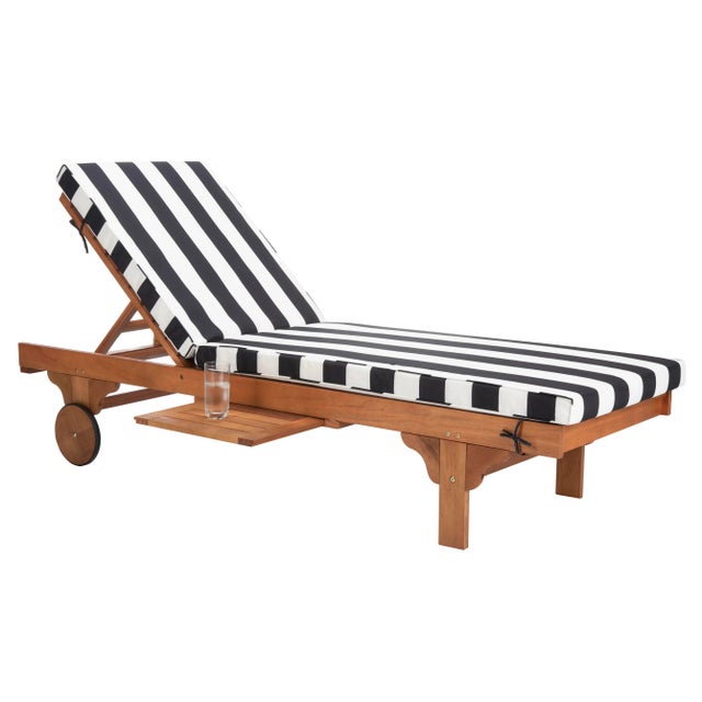 A fresh update of a of a English garden classic, the outdoor chaise lounge chair recalls the manicured landscapes of Rhode...