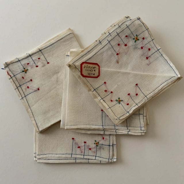 Charming set of 12 hand-embroidered tulle napkins from China. Probably for tea, not dinner.
