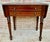 Elegant Spanish drop-leaf side table crafted from wood, featuring two practical drawers with round metal handles and four...