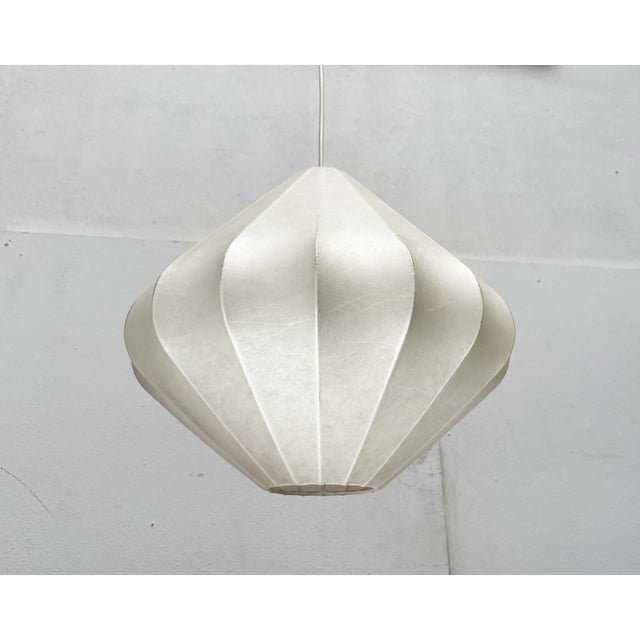 Mid-Century Modern Cocoon pendant lamp by Goldkant Leuchten, designed by Friedel Wauer in the 1960s. A minimalist design,...