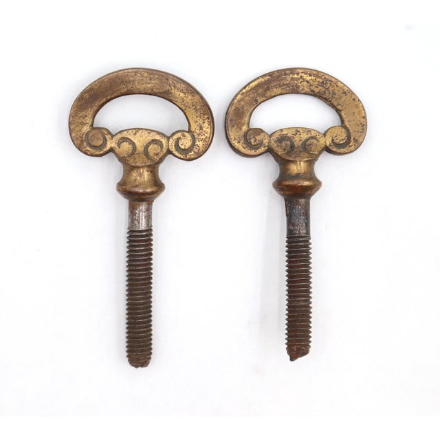 Traditional style mirror screws with a brass knob and a steel screw. Good condition with surface wear and rust from prior...