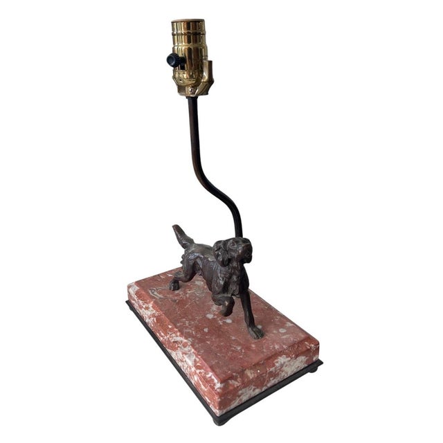 This striking vintage accent lamp beautifully blends classic sporting art with functional illumination. At its centerpiece...