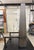 A monumental pair of custom Chesneys oxidized steel andirons in the classic obelisk shape. The timeless style of these...
