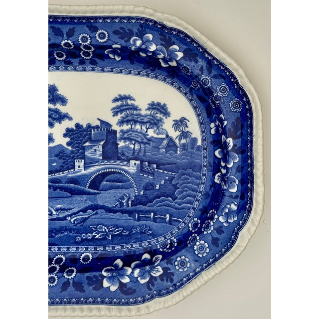 A richly colored antique Copeland Spode “Tower” platter dated March 1903, featuring vivid cobalt blue transferware...
