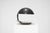 Cobra 629 table lamp in resin (bakelite color) with a swiveling arm and base. Designed by Elio Martinelli for Martinelli...