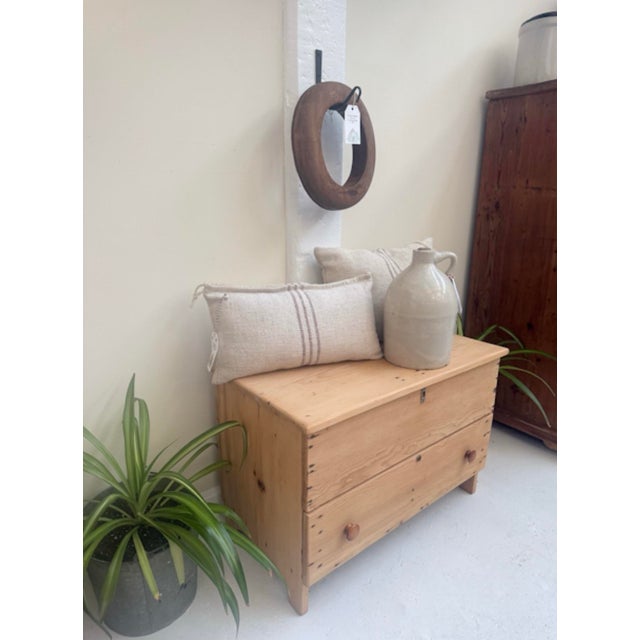 This petite antique scrubbed pine chest is a charming 19th‑century piece with a wonderfully compact footprint and a...