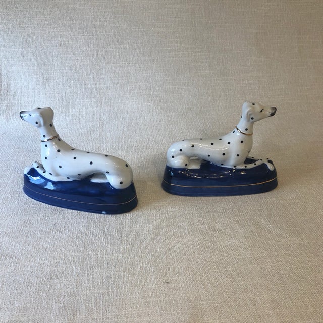 Pair of Staffordshire Dalmatians with blue base and gold trim!