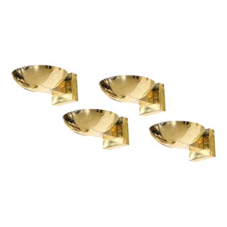 1950s Country of Origin Finland Item Type Set of Four Mid-Century Modernist Polished Brass Sconces by Paavo Tynell For Sale