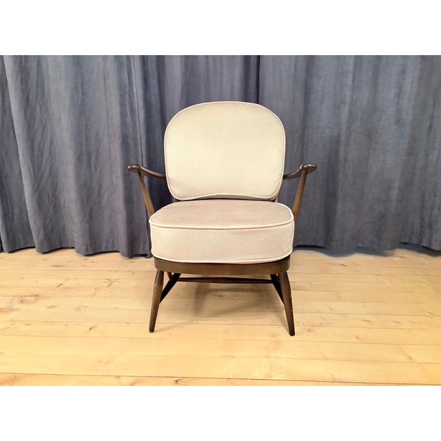 Windsor armchair by Lucian Ercolani for Ercol from the 1960s. In original and good condition. No cracks, chips, or repairs...