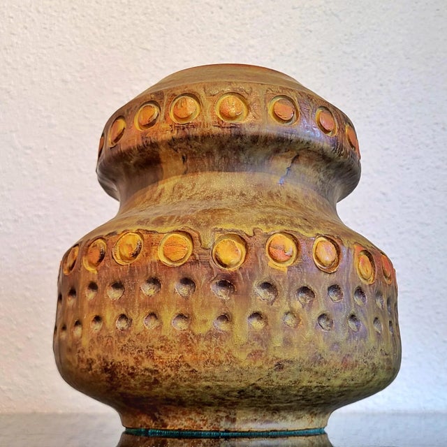 A large, orange and green, double-gourd bouquet vase designed by the great Alvino Bagni for American importer Raymor. The...