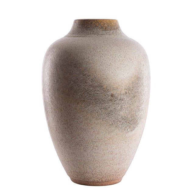 A simple but elegant ceramic vase from Ceramano West Germany is offered. The vase has a classic bulbous shape with a...