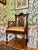 The original owners had labeled this chair as “antique” but we are seeing construction more from the mid 20th century....