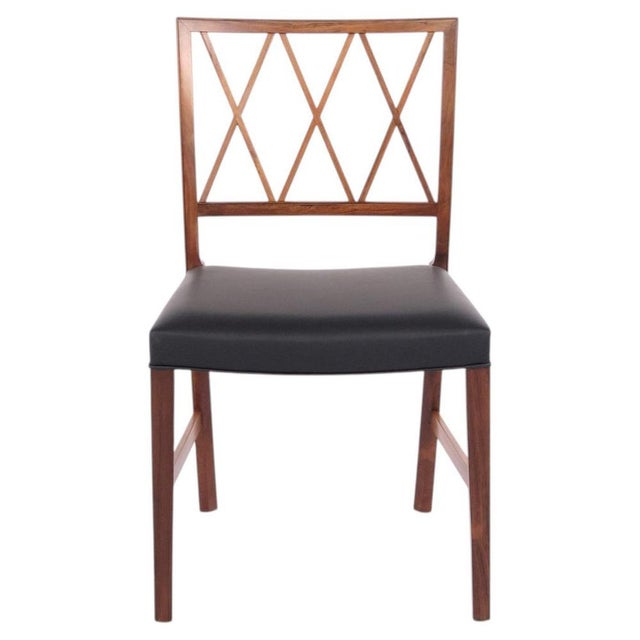 Set of 4 dining chairs designed by danish furniture architect ole wanscher and crafted by master cabinetmaker a.j. Iversen...