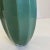A study in restraint, this vintage art glass bud vase demonstrates how thoughtful form can create lasting impact. Rendered...