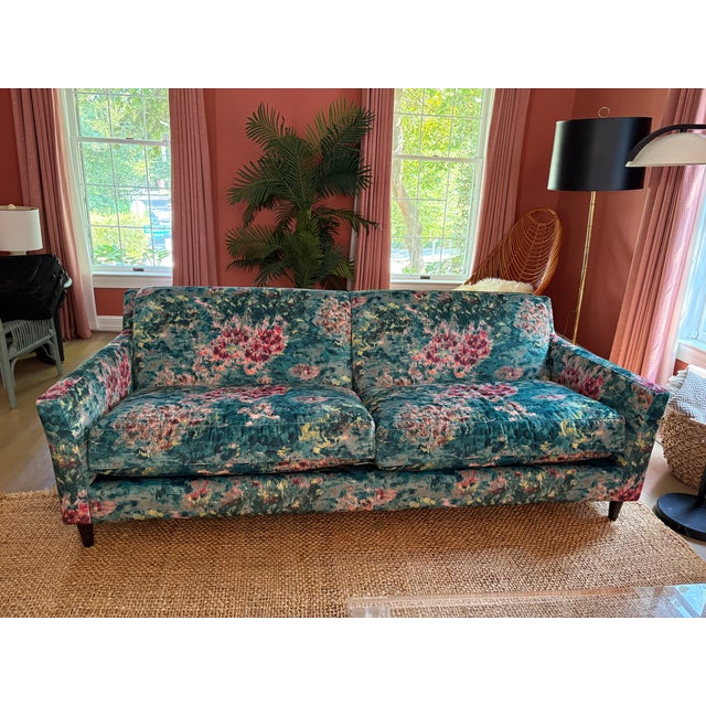 This custom-made sofa combines clean contemporary lines with luxurious upholstery in a striking Kravet velvet. The richly...