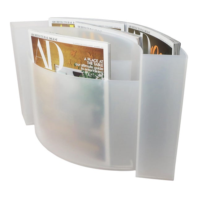 Practical and decorative, the Wave magazine rack was designed by German Hansjerg Maier-Aichen for the designed brand...