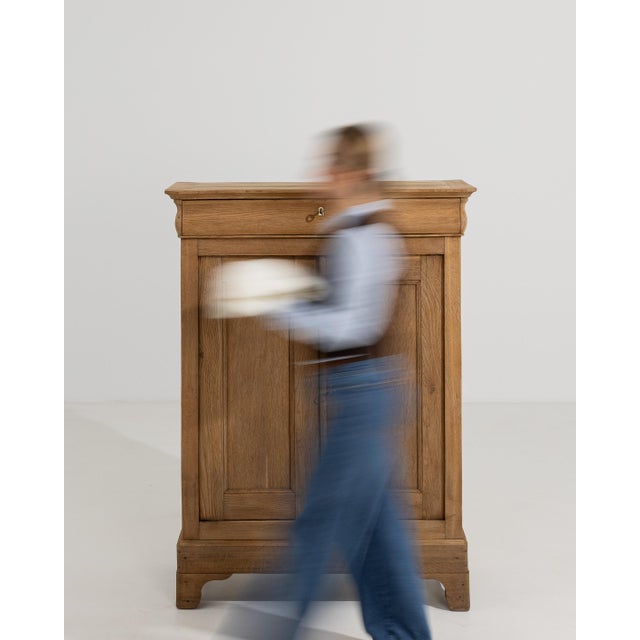 A refined Louis Philippe buffet crafted from oak, featuring soft curves and understated elegance. The design emphasizes...