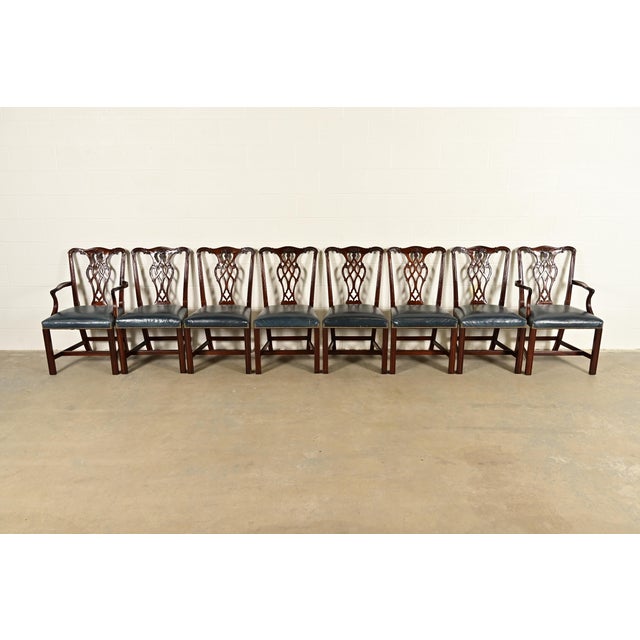 A gorgeous set of eight Georgian or Chippendale style dining chairs By Councill Craftsmen USA, Circa 1980s Carved solid...