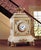 This regal mantle clock is crafted from luminous white alabaster and adorned with intricately cast bronze ormolu, finished...